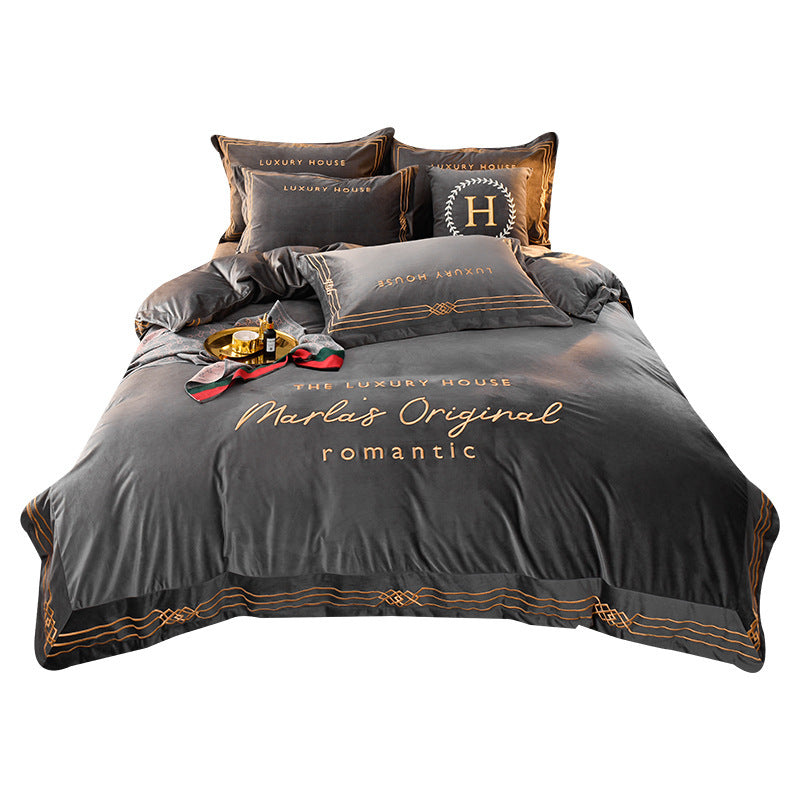 Four-Piece Milk Velvet Set On Light Luxury Bed