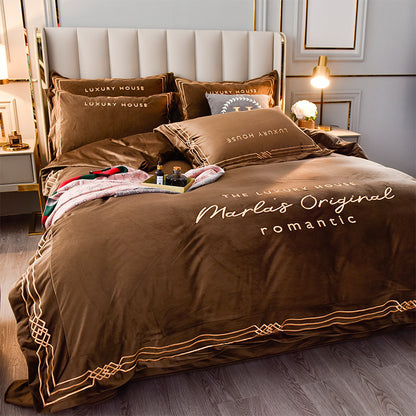 Four-Piece Milk Velvet Set On Light Luxury Bed