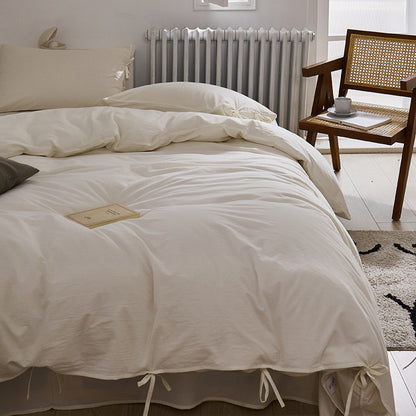 Ensemble quatre pièces en pur coton, housse de couette et drap de lit en coton blanc