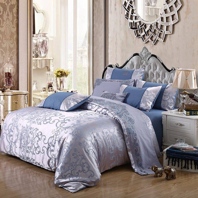 Literie quatre pièces en satin jacquard actif