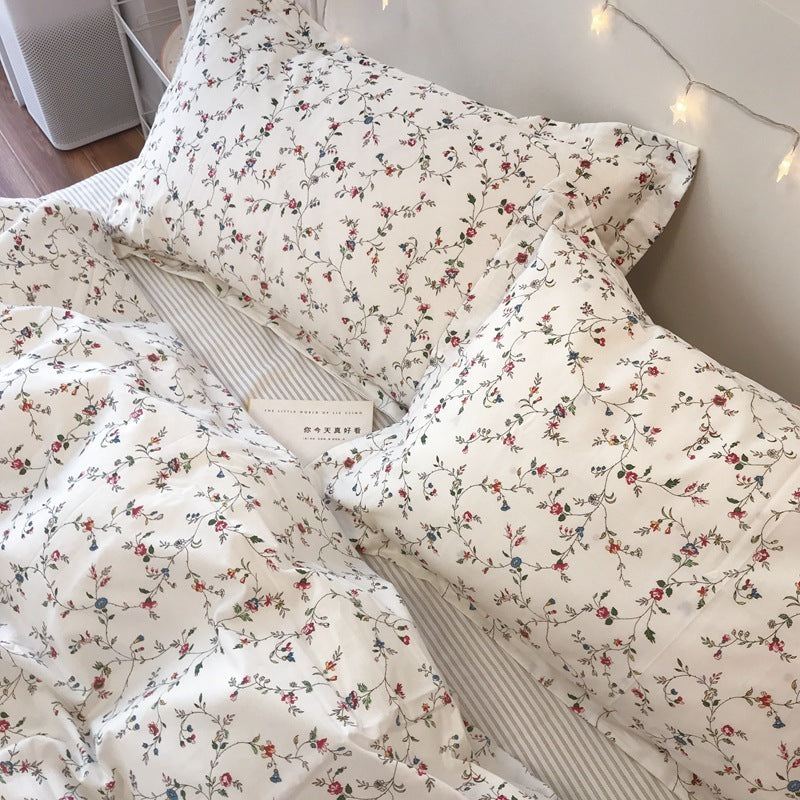 Juego de cama de cuatro piezas de algodón con estampado floral pequeño