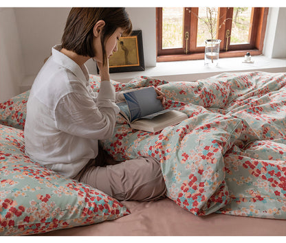 Juego de cama de cuatro piezas con funda de edredón y sábana estilo pastoral con pequeñas flores retro