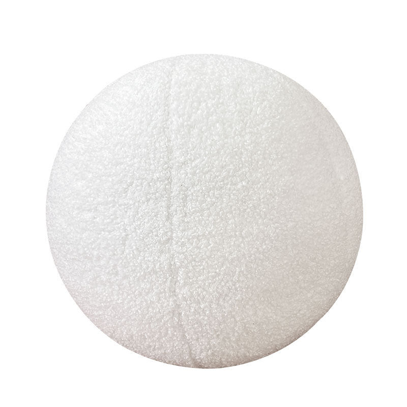 Coussin en peluche à forme géométrique avec boule et corde nouée