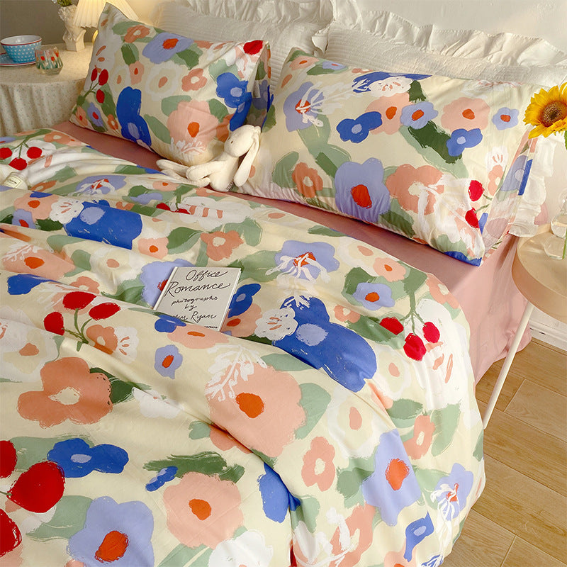 Juego de cama de cuatro piezas con diseño de corazón y flores pequeñas para niña