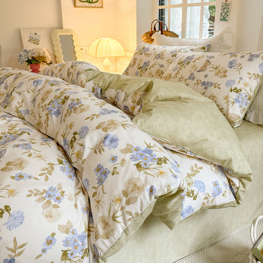 Juego de cama de algodón de cuatro piezas con estampado floral pequeño y sencillo