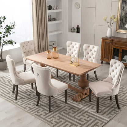 A set of 6 beige velvet dining chairs, soft cushioned plush chairs with nail heads and solid wood legs with loop edges