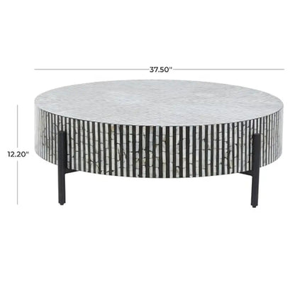 Table basse ronde moderne en nacre géométrique avec pieds gris et noirs pour salon