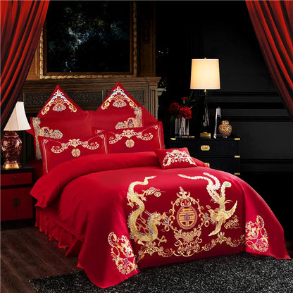 Ensemble de quatre pièces grande literie brodée rouge pour jeunes mariés ensemble de fête de mariage couette dragon et phénix literie brodée draps de lit housse de couette