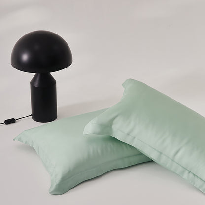 Sábana individual de seda helada y funda de almohada agradable para la piel