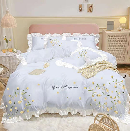 Housse de couette brodée en quatre pièces pour lit en coton lavé