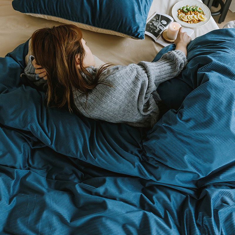 Juego de cama de cuatro piezas de vellón de leche de invierno